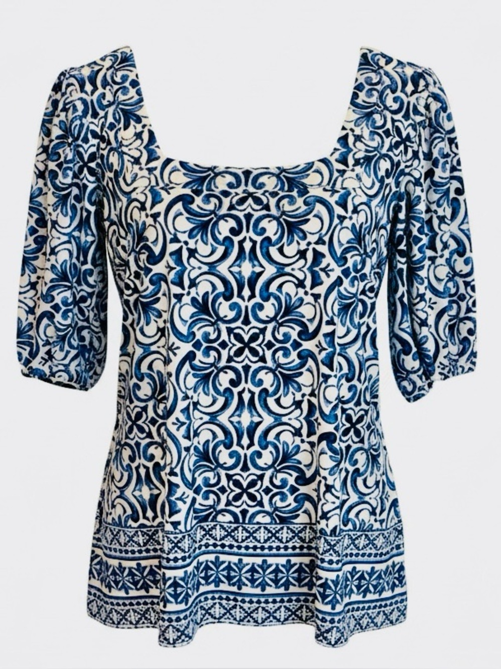 CeCe Navy and White Floral Blouse with puff sleeve.